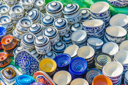 colorful bone china cups and pots for saleの写真素材