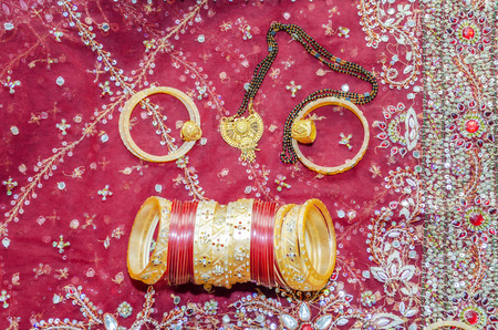 Indian wedding day accessories bangles rings  and gold  jewellery 
