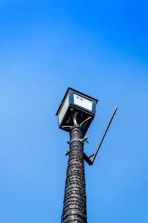 wired night light against blue clean skyの写真素材