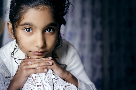 indian asian fashion model girl child portrait posing for cameraの写真素材