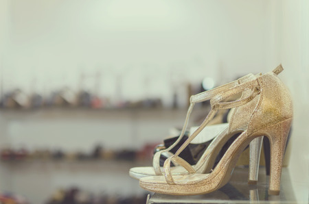 women shoes on sale store with on focus with bokeh backgroundの写真素材