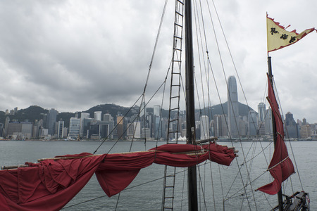 ship with red sails in the harbor of Hong Kongのeditorial素材