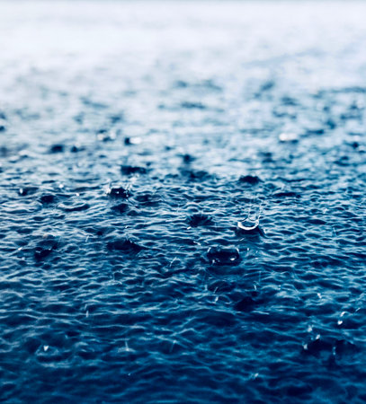 Heavy rain pours down the groundの写真素材