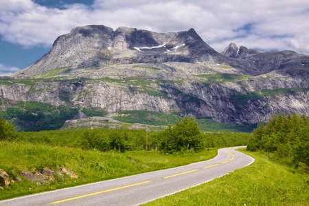 Coastal tourist road in Norway with picturesque view of mountainsの写真素材