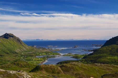 Scenic panorama of fjord with islands and picturesque fishing villages on Lofoten islands in Norwayの写真素材