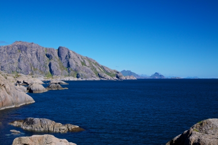 Rocky norwegian coastline on Lofoten islands in summerの写真素材
