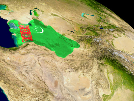 Map of Turkmenistan with embedded flag on planet surface. 3D illustration.の写真素材