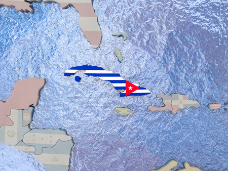 Map of Cuba with national flag on political globe with realistic water. 3D illustrationの写真素材