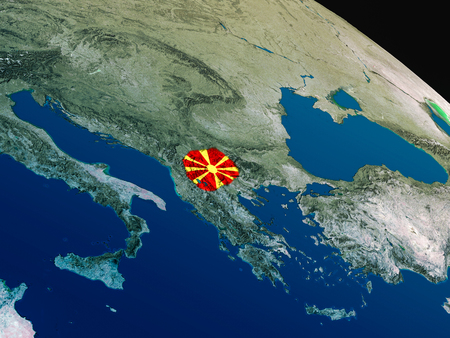 Macedonia with embedded national flag as if seen from Earth's orbit in space. 3D illustration with highly detailed realistic planet surface.の写真素材