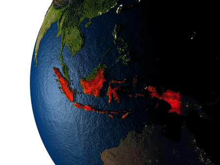 Indonesia highlighted in red on Earth as seen from Earth's orbit in space during sunset. 3D illustration with highly detailed realistic planet surface.の写真素材