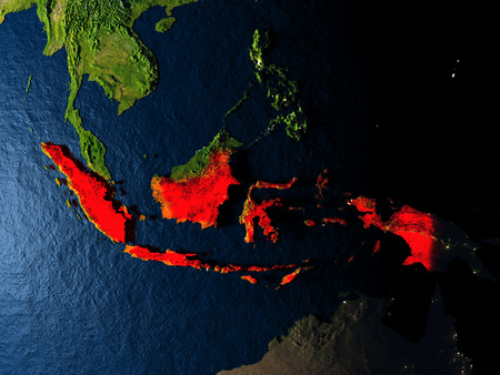 Indonesia in red at night as seen from Earth's orbit in space. 3D illustration with highly detailed realistic planet surface. Elements of this image furnished by NASA.の写真素材