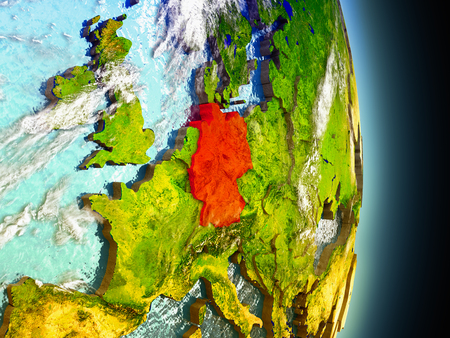 Model of Germany from Earth's orbit in space. 3D illustration with highly detailed realistic planet surface and clouds in the atmosphere.の写真素材