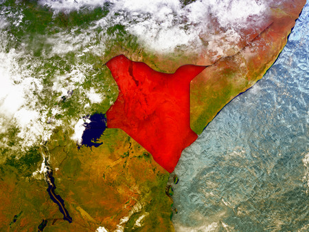 Kenya highlighted in red on illustrated globe with realistic ocean waters and clouds as seen from Earth's orbit in space. 3D illustration with high level of detail.の写真素材
