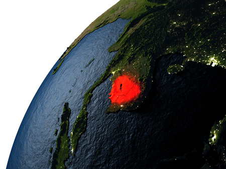 Cambodia highlighted in red on planet Earth with visible city lights. 3D illutration with detailed planet surface.の写真素材