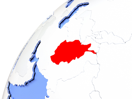 Map of Afghanistan in red on elegant modern metallic globe. 3D illustrationの写真素材