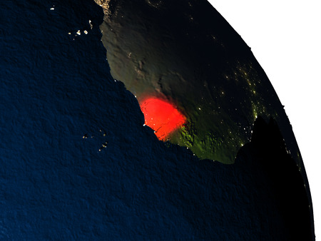 Senegal highlighted in red on model of planet Earth with very detailed land surface and visible city lights. 3D illustration.の写真素材