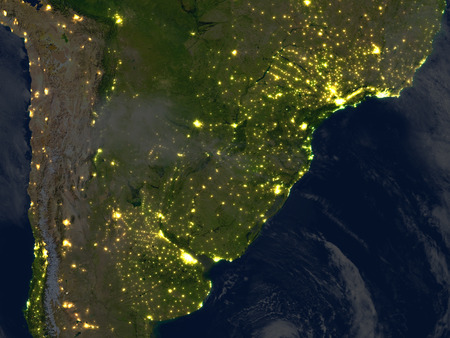 Pampa at night. 3D illustration with detailed planet surface and visible city lights.の写真素材