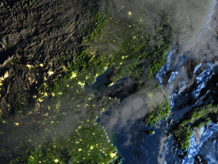 Japan and Koreas on 3D model of Earth at night. 3D illustration with plastic planet surface and ocean floor and visible city lights.の写真素材