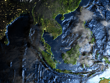 Indonesia on 3D model of Earth at night. 3D illustration with plastic planet surface and ocean floor and visible city lights.の写真素材