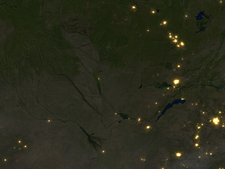 Okawango delta at night. 3D illustration with detailed planet surface and visible city lights.の写真素材