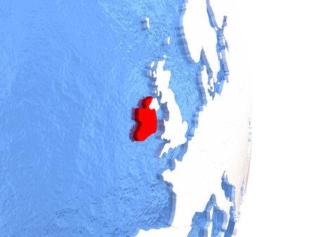Ireland on globe with realistic blue water and shiny metallic continents. 3D illustrationの写真素材