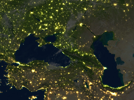 Caucasus region at night. 3D illustration with detailed planet surface and visible city lights.の写真素材