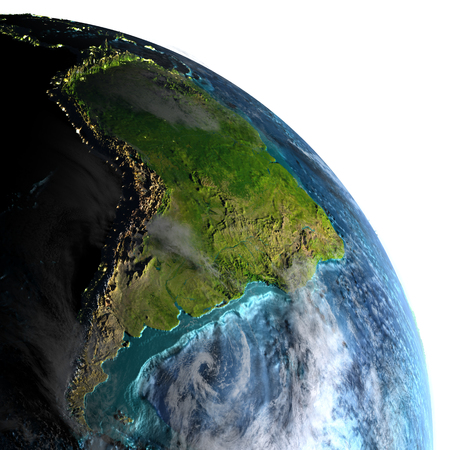South America on Earth with detailed planet surface and visible city lights. 3D illustration with white background.の写真素材