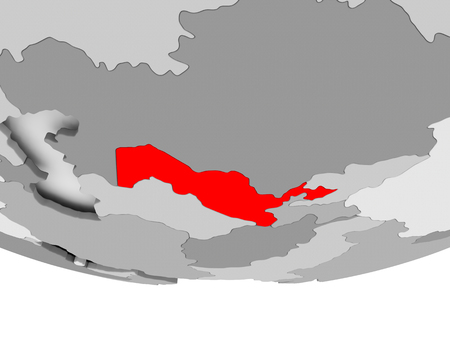 Uzbekistan in red on grey political globe. 3D illustration.の写真素材