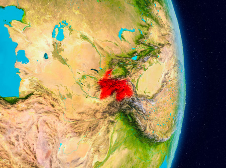 Country of Tajikistan in red on planet Earth. 3D illustration.の写真素材