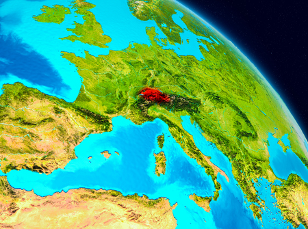 Space view of Switzerland highlighted in red on planet Earth. 3D illustration.の写真素材