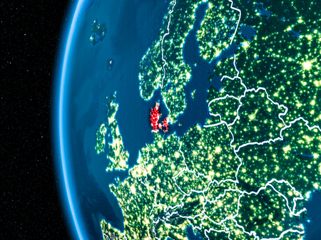 Space orbit view of Denmark highlighted in red on planet Earth at night with visible country borders and city lights. 3D illustration.の写真素材