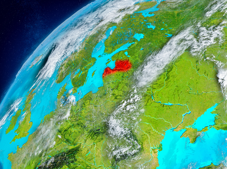 Country of Latvia in red on planet Earth with atmosphere. 3D illustration.の写真素材