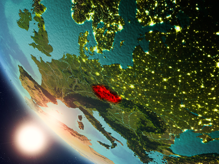 Satellite view of Czech republic highlighted in red on planet Earth with visible country borders during sunset. 3D illustration.の写真素材