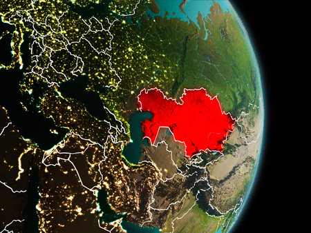 Satellite morning view of Kazakhstan highlighted in red on planet Earth with visible border lines and city lights. 3D illustration. Elements of this image furnished by NASA.の写真素材