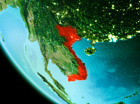 Country of Vietnam in red on planet Earth in the evening. 3D illustration.の写真素材