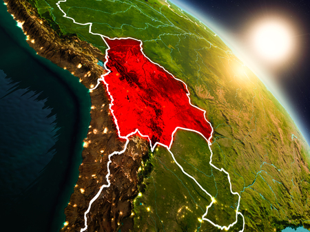 Sunset above Bolivia from space on planet Earth with visible country borders. 3D illustration.の写真素材