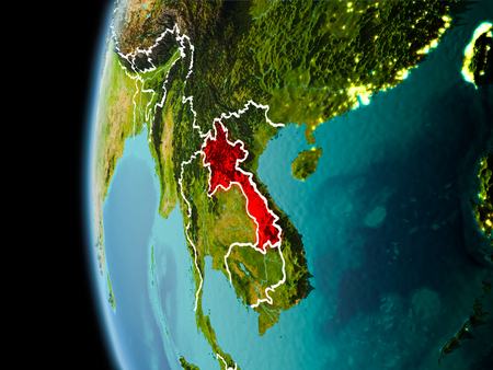 Evening over Laos as seen from space on planet Earth with visible border lines and city lights. 3D illustration.の写真素材