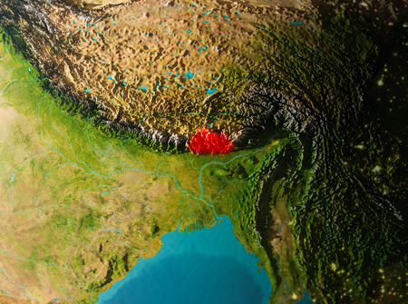 Bhutan in early morning light highlighted in red on planet Earth. 3D illustration.の写真素材