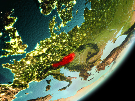 Austria in the morning highlighted in red on planetの写真素材
