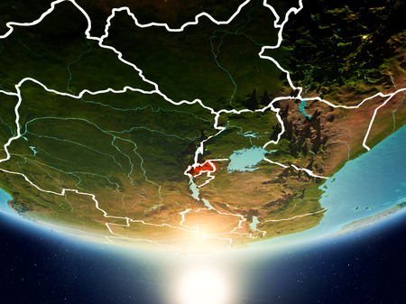 Rwanda from orbit of planet Earth in sunrise with highly detailed surface textures and visible country borders. 3D illustration.の写真素材