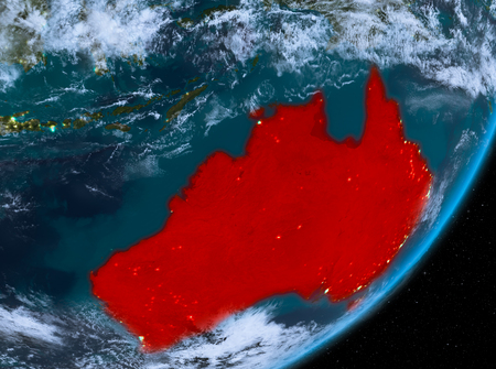 Australia from orbit of planet Earth at night with highly detailed surface textures and clouds. 3D illustration.の写真素材