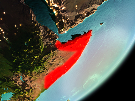 Somalia in the morning highlighted in red on planet Earth. 3D illustration.の写真素材