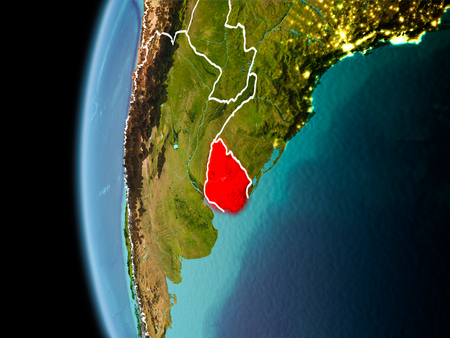 Evening over Uruguay as seen from space on planet Earth with visible border lines and city lights. 3D illustration.の写真素材
