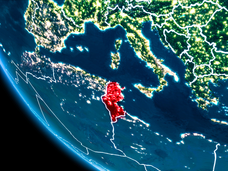 Map of Tunisia in red as seen from space on planet Earth at night with white borderlines and city lights. 3D illustration.の写真素材