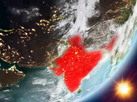 India from orbit of planet Earth in sunrise with highly detailed surface textures and clouds. 3D illustration.の写真素材
