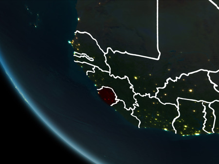 Satellite view of Sierra Leone highlighted in red on planet Earth at night with borderlines and city lights. 3D illustration.の写真素材