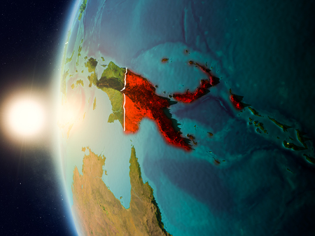 Illustration of Papua New Guinea as seen from Earthâs orbit during sunset with visible country borders. 3D illustration.の写真素材