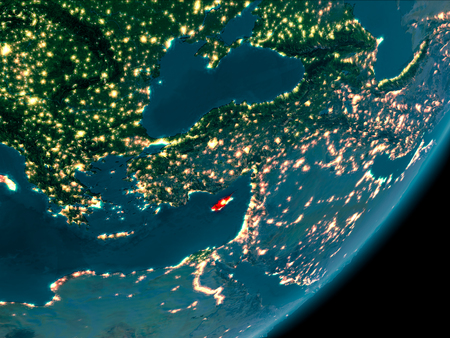 Night view of Cyprus highlighted in red on planet Earth with atmosphere. 3D illustration.の写真素材