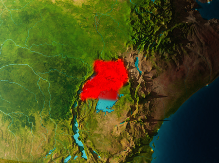 Uganda in early morning light highlighted in red on planet Earth. 3D illustration.の写真素材