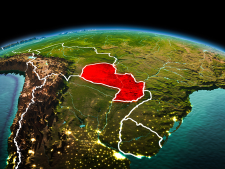 Morning above Paraguay highlighted in red on model of planet Earth in space with visible border lines and city lights. 3D illustration.の写真素材
